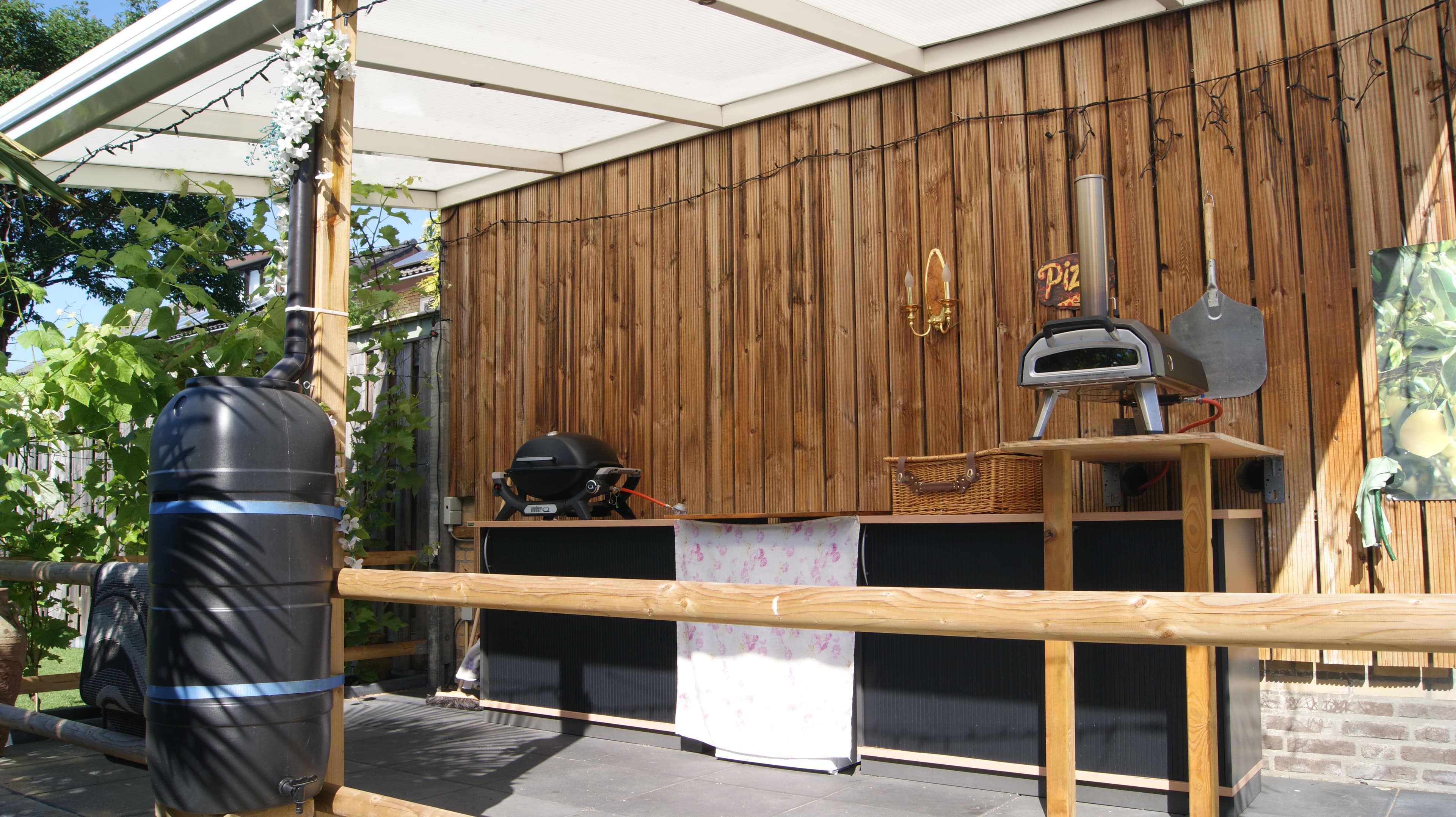 Tuinkamer met glaspanelen